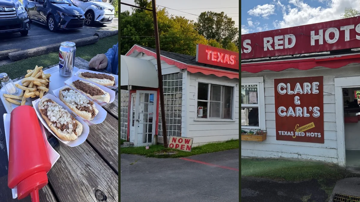 Outdoor picnic tables beside a roadside hot dog stand.